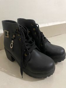 Black leather boots