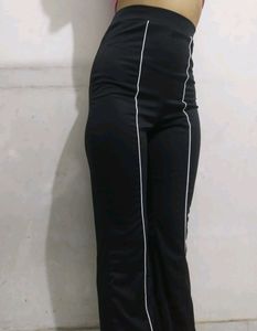 Combo of SSS black bootcut trousers and H&amp;M peach top