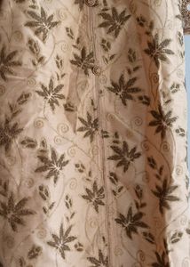 A golden mirror work on jorget suit . with neck work and sleeves fully work completed with salvar and dupatta