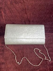 Sparkling Silver Clutch cum sling with chain👛