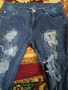 Ripped &amp; Distressed Denim Jeans