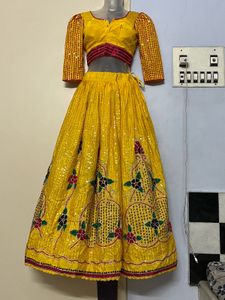 Full Work Embodiment Yellow Lehenga Choli