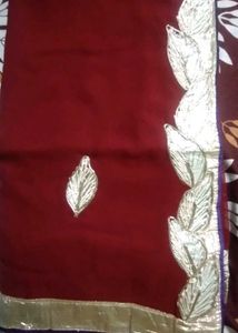 Elegant Maroon Saree with Silver Details
