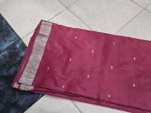 Elegant burgundy Saree with silver border