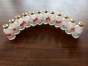 12 Empty Insulin Bottles