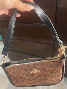 Coach Clutch sling Bag