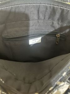 Sling + Handbag
