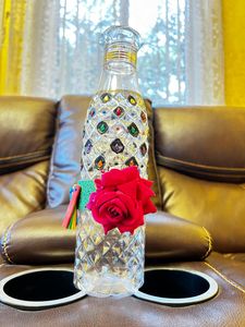 Crystallized designer plastic bottle