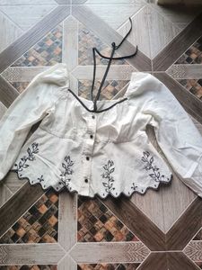 Embroidered Peplum Top