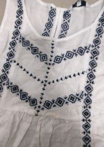 White Embroidered Sleeveless Top