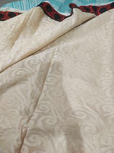 cream colour saree