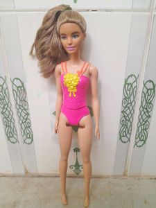 2  Barbie Dolls In Used Condition