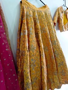 Yellow Bridal Partywear Lehenga .With Pink Dupatta