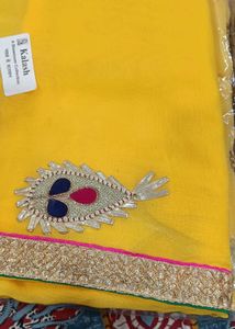 2 Yellow Sarees