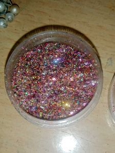 Elegant Jhumka Earrings and nail glitter