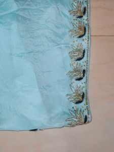 Cinon Fabric Cyan Colour Saree Without Blouse