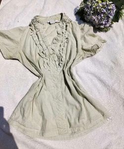 Ruffled Cream Top