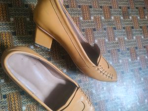 Women Pumps,there is a little scratch as shown in the picture but not visible