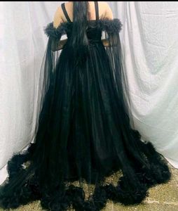 Elegant Black Gown with Cape