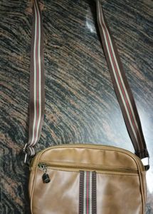 Brown Multishaded Sling Bag.
