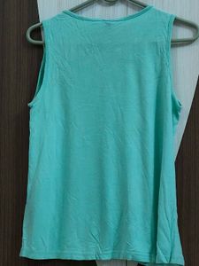 cyan sleeveless top 🩵