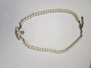 Gold Chain Necklace And Mars Lip Liner
