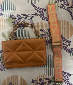 Quilted Orange Sling Bag With A Chain