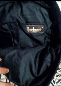 Black &amp; Beige Printed Backpack