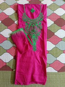 Solid Pink Colour Kurta With Green Embroidery.