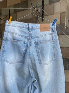 Ripped Light Wash Baggy Jeans