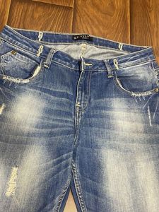 Distressed Denim Jeans