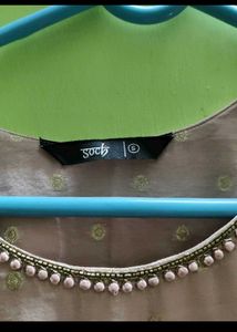 Elegant Beige Embroidered Kurta