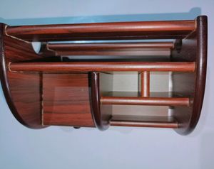A wooden makeup or pen stand