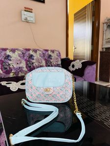 Sky Blue Sling Bags.