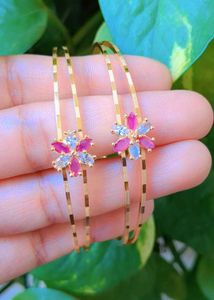 Floral Design Gold Bangles