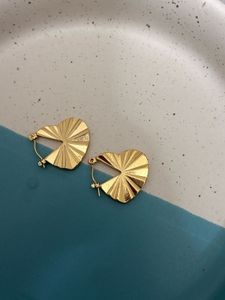 Heartbeat Radiance - Sculpted Gold HeartHoop Earr