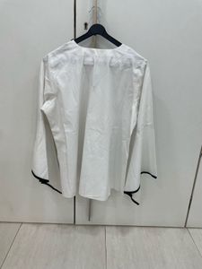 🌟 Monochrome Magic: Bell-Sleeve Statement Top! 🤍