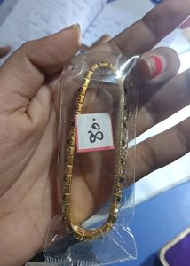 Stone Fitted Golden Bracelet