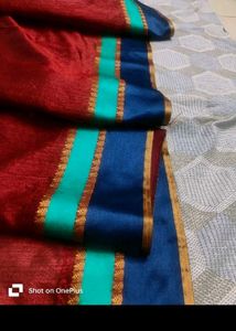 beutiful maroon saree with sleeveless blouse