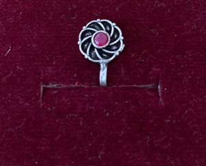 Sizzling Oxidized Clip On Nose Pin