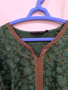 Green floral print kurti with golden detailing