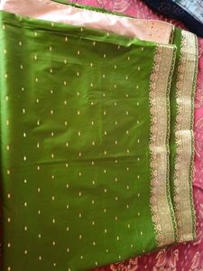 beautiful leaf green ,lightweight saree with golde