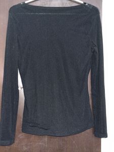 Black top with floral lace on neck