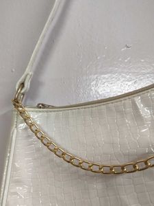 Chic Shoulder Bag with Chain Detail