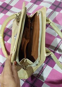 A Used Gold Colour Purse Ok In Condition
