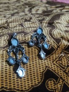 green stoned long earings