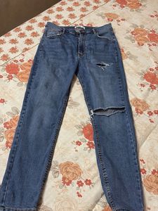 Ripped Knee Denim Jeans