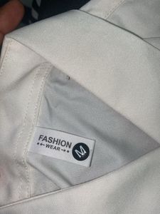 Elegant Minimalism: Prada White Triangle Logo Shir