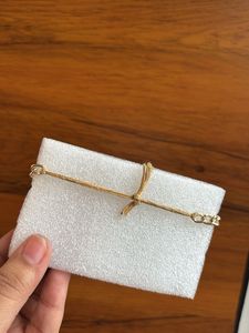 Bracelet with initial letter and real flower
