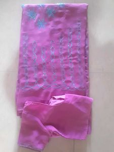 Ambroider saree with blouse.
